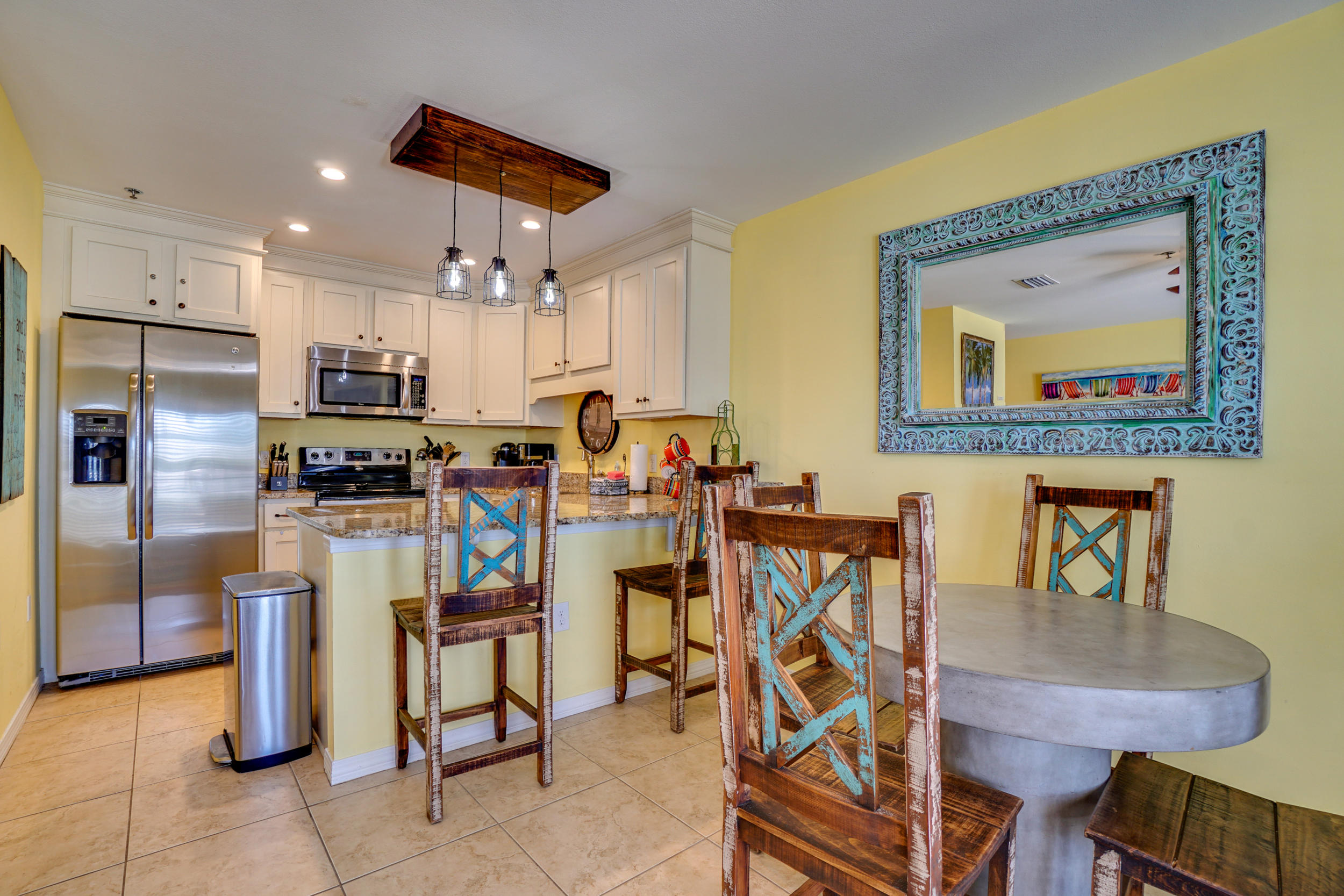 144 Spires Lane, Unit 107 Santa Rosa Beach, FL 32459 - Photo 6 of 17 a view of a dining room with furniture