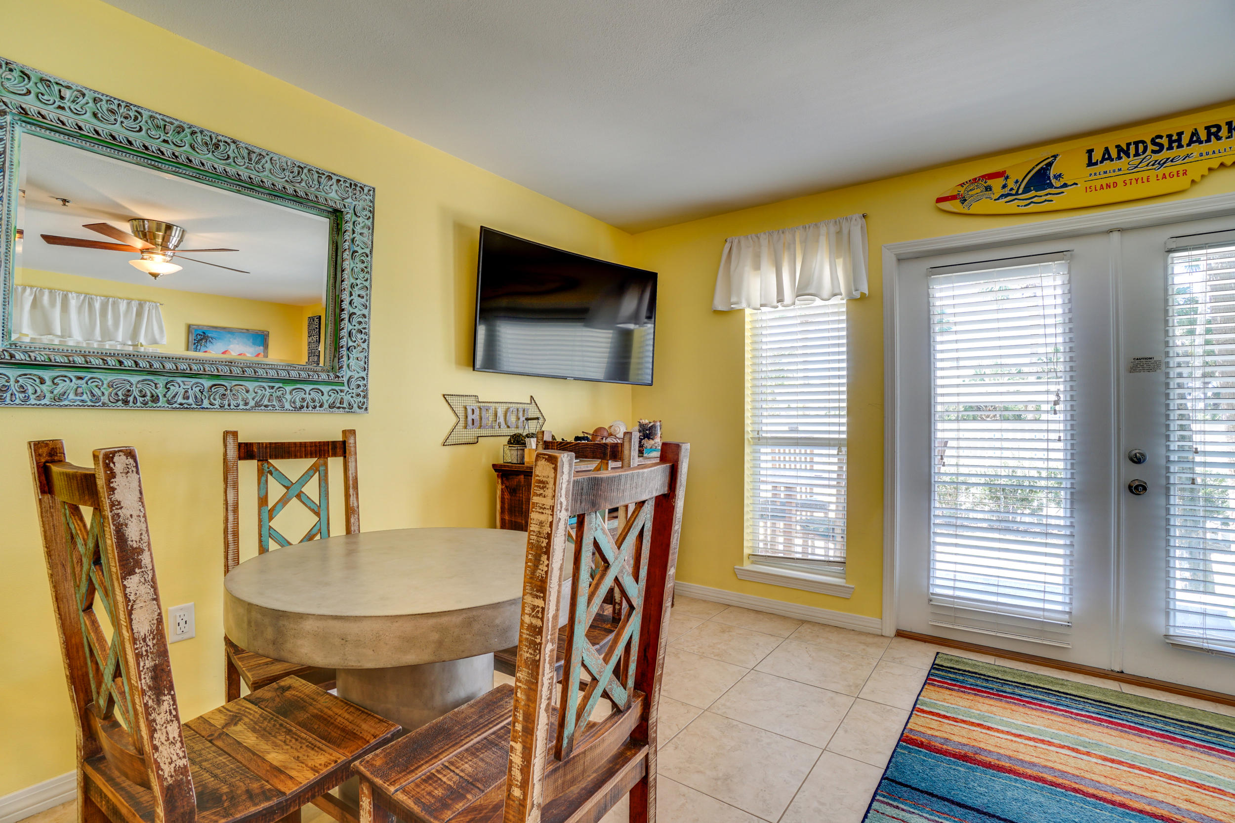 144 Spires Lane, Unit 107 Santa Rosa Beach, FL 32459 - Photo 8 of 17 a dining room with furniture and window
