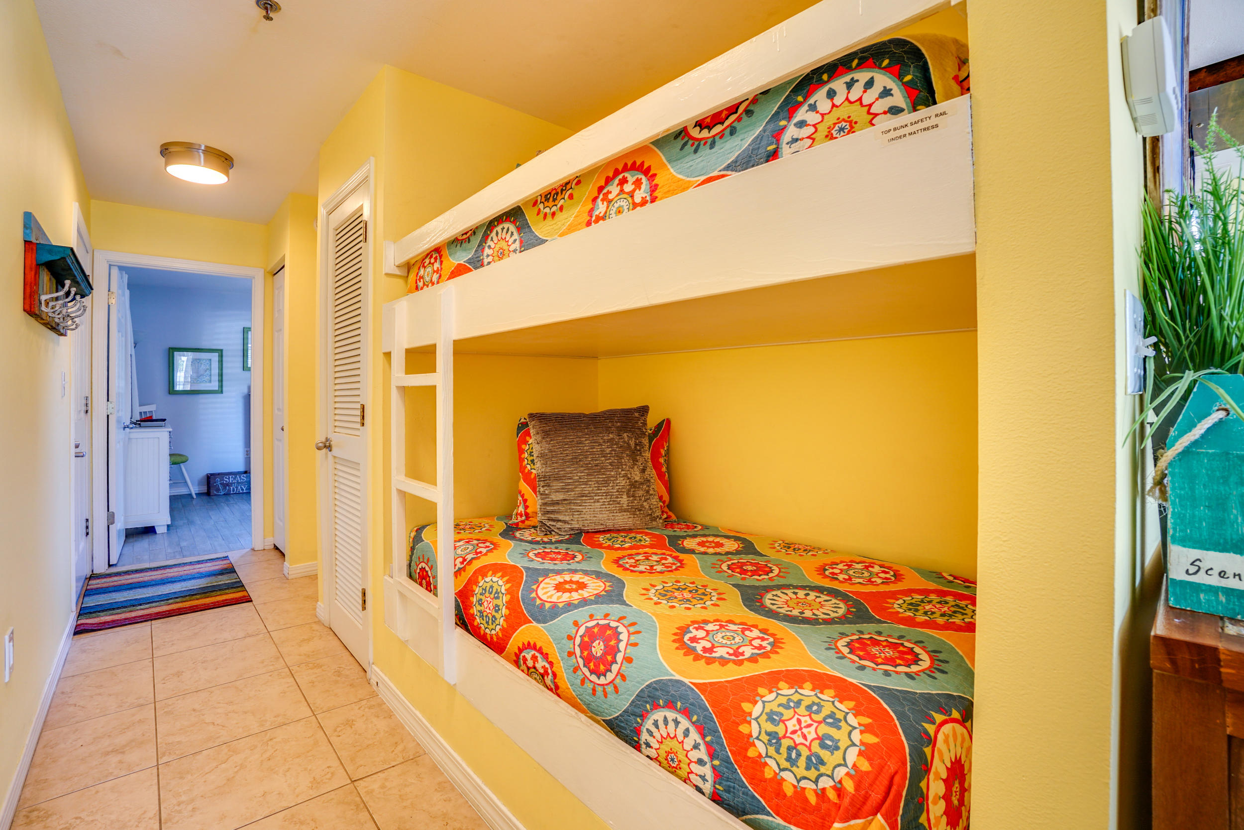 144 Spires Lane, Unit 107 Santa Rosa Beach, FL 32459 - Photo 10 of 17 a bedroom with a bed and a painting on the wall
