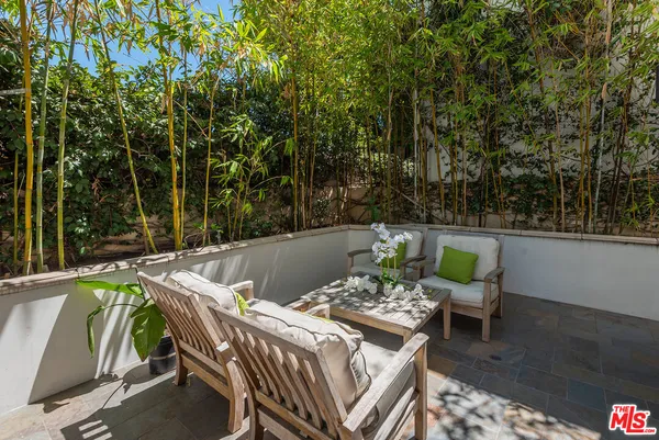 a view of balcony with furniture and outdoor space
