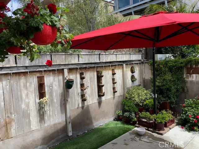 a view of water fountain in front of house