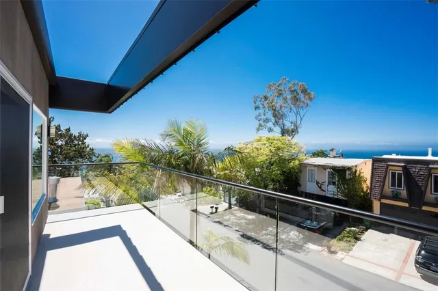 a view of balcony with a potted plant
