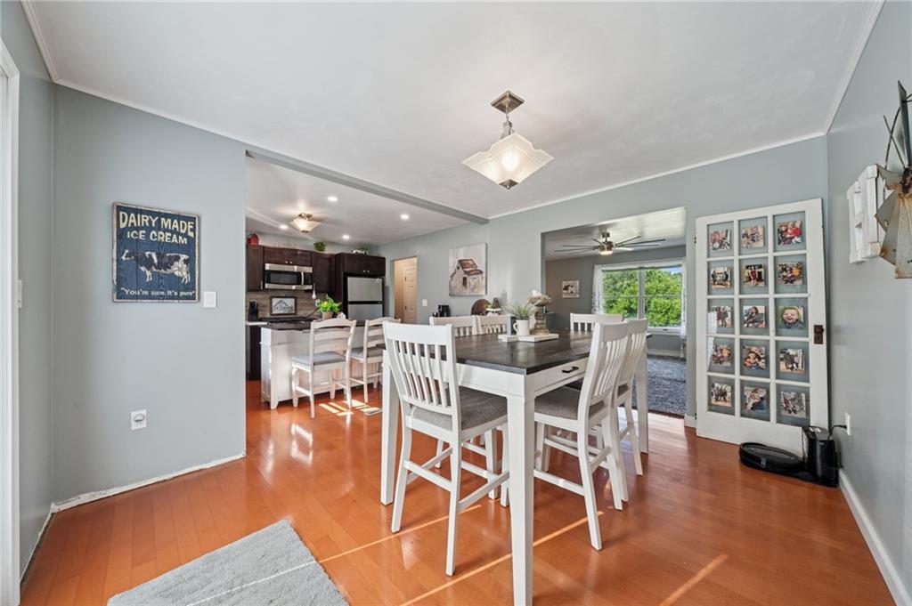 5 Trice Drive Mount Pleasant, PA 15666 - Photo 15 of 47 a dining room with furniture and wooden floor