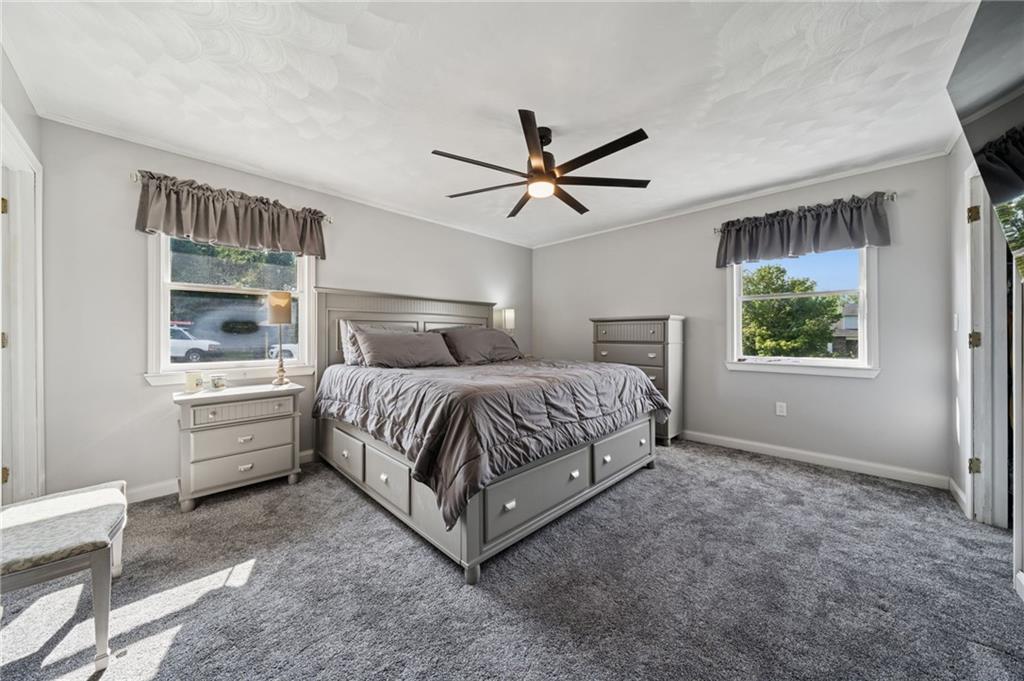 5 Trice Drive Mount Pleasant, PA 15666 - Photo 19 of 47 a bedroom with a large bed and a window