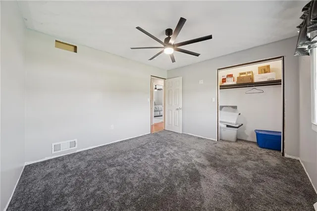 a view of a livingroom with a flat screen tv