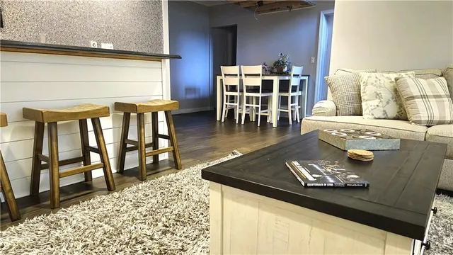 a living room with furniture and a table