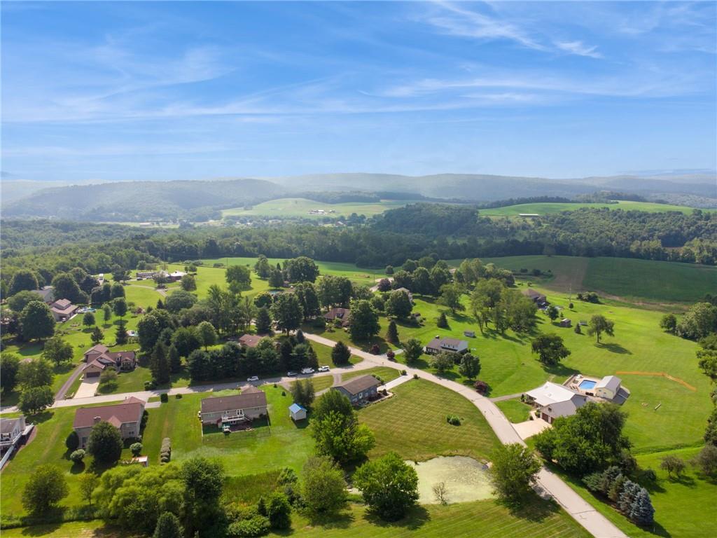 5 Trice Drive Mount Pleasant, PA 15666 - Photo 46 of 47 an aerial view of lake and residential houses with outdoor space