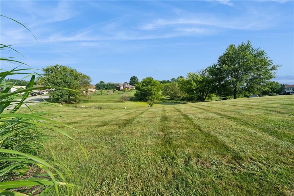 5 Trice Drive Mount Pleasant, PA 15666 - Photo 7 of 47 a view of a field with an trees in the background