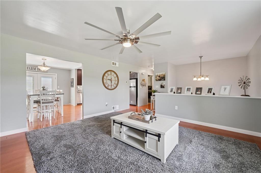 5 Trice Drive Mount Pleasant, PA 15666 - Photo 9 of 47 a living room with furniture and a clock