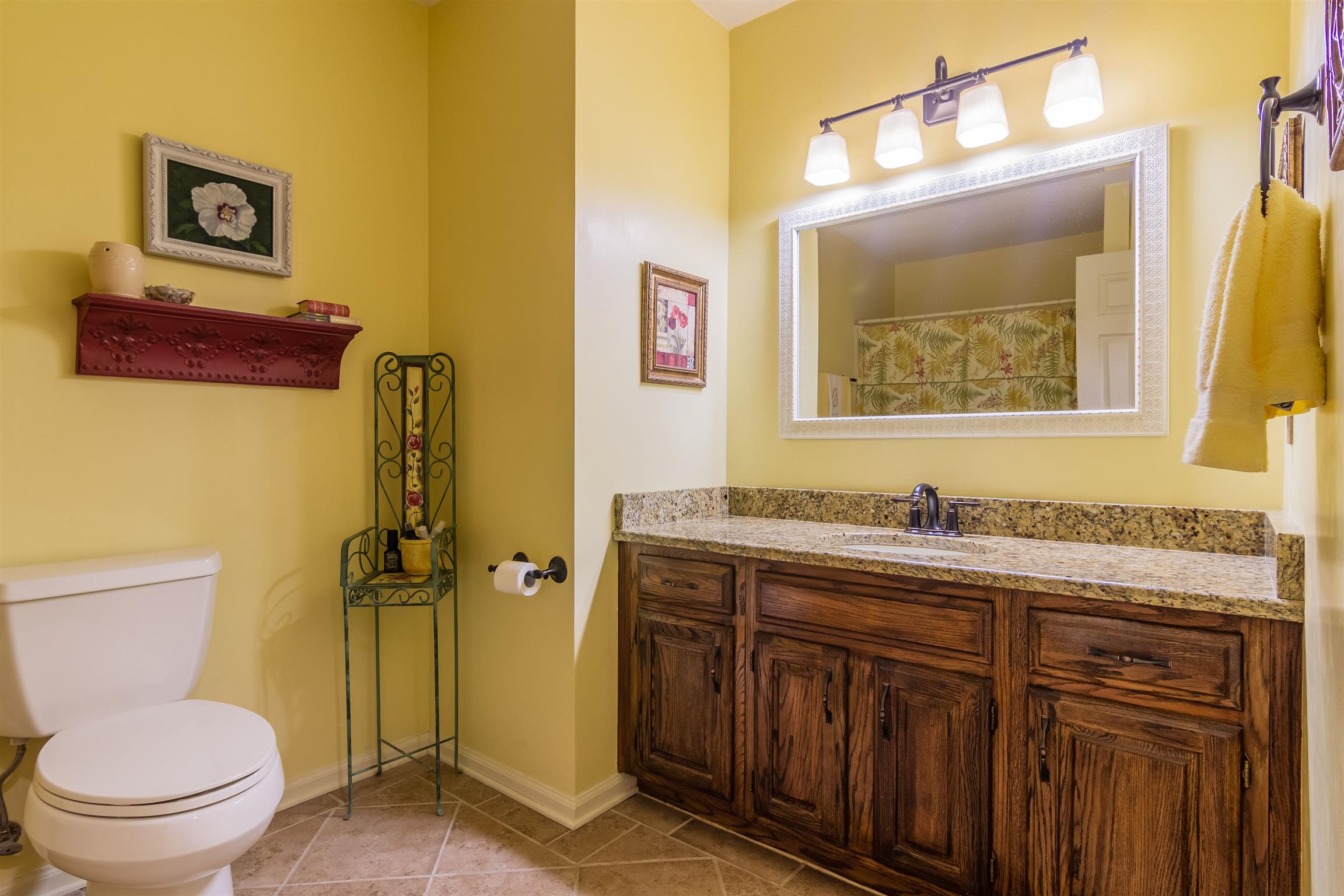 2842 Sulphur Springs Road Murfreesboro, TN 37129 - Photo 17 of 28 Guest bath with granite counter tops, tile floor and tub shower combination