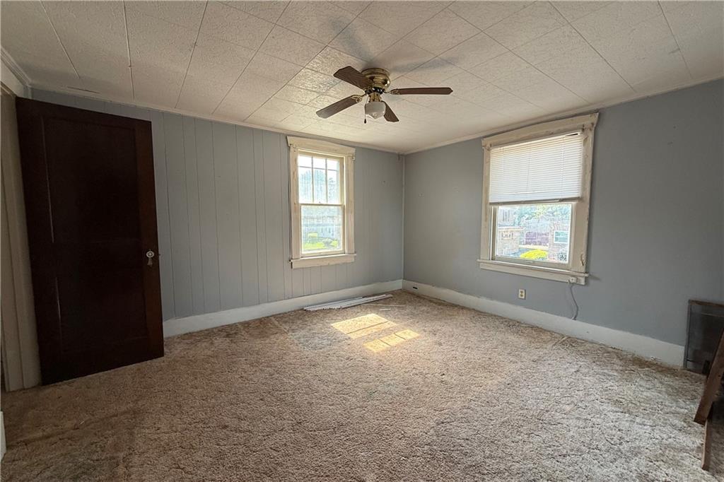 1045 Myrtle Place Sharon, PA 16146 - Photo 11 of 16 a view of an empty room and window