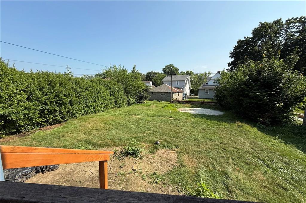 1045 Myrtle Place Sharon, PA 16146 - Photo 15 of 16 a view of a yard with wooden fence