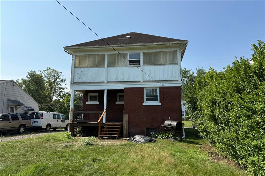 1045 Myrtle Place Sharon, PA 16146 - Photo 16 of 16 a front view of a house with a yard