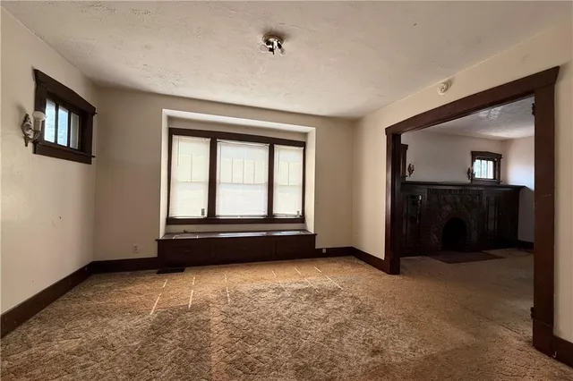 an empty room with windows