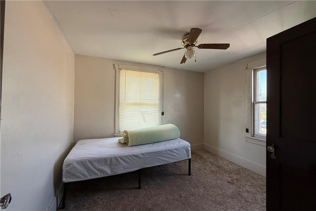 1045 Myrtle Place Sharon, PA 16146 - Photo 8 of 16 a bedroom with a bed and window