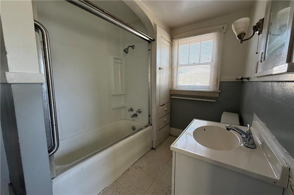 1045 Myrtle Place Sharon, PA 16146 - Photo 9 of 16 a bathroom with a sink toilet and shower