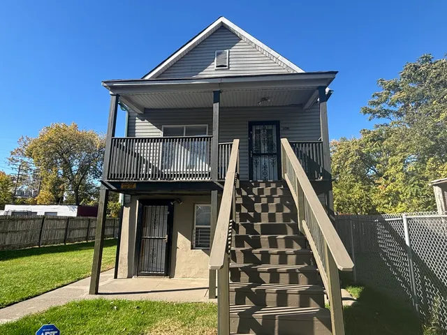 front view of a house with a small yard