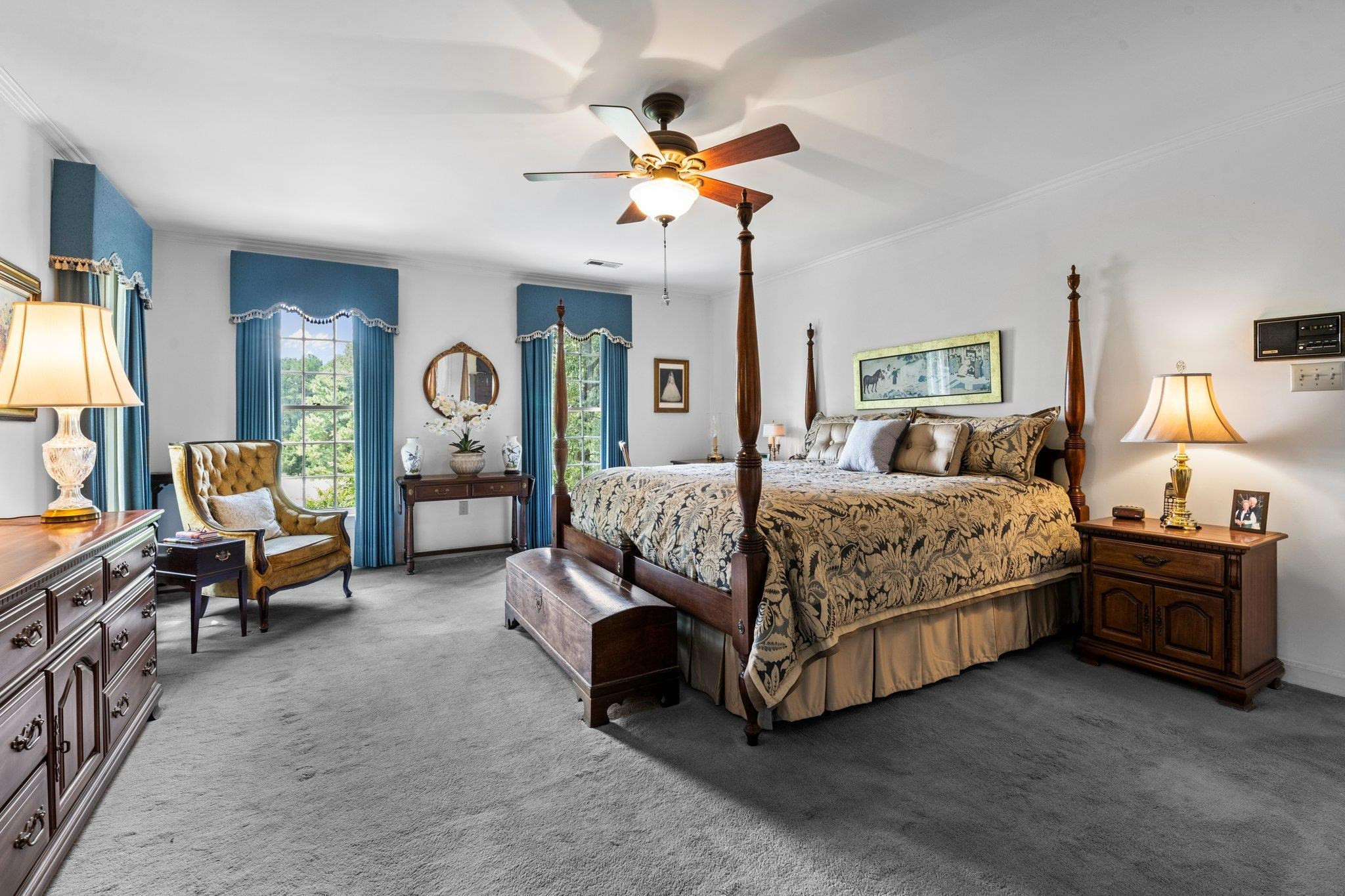 5101 Holly Ridge Farm Road Raleigh, NC 27616 - Photo 29 of 63 Large Primary Bedroom with lots of windows for natural light and ceiling fan. Primary Bedroom