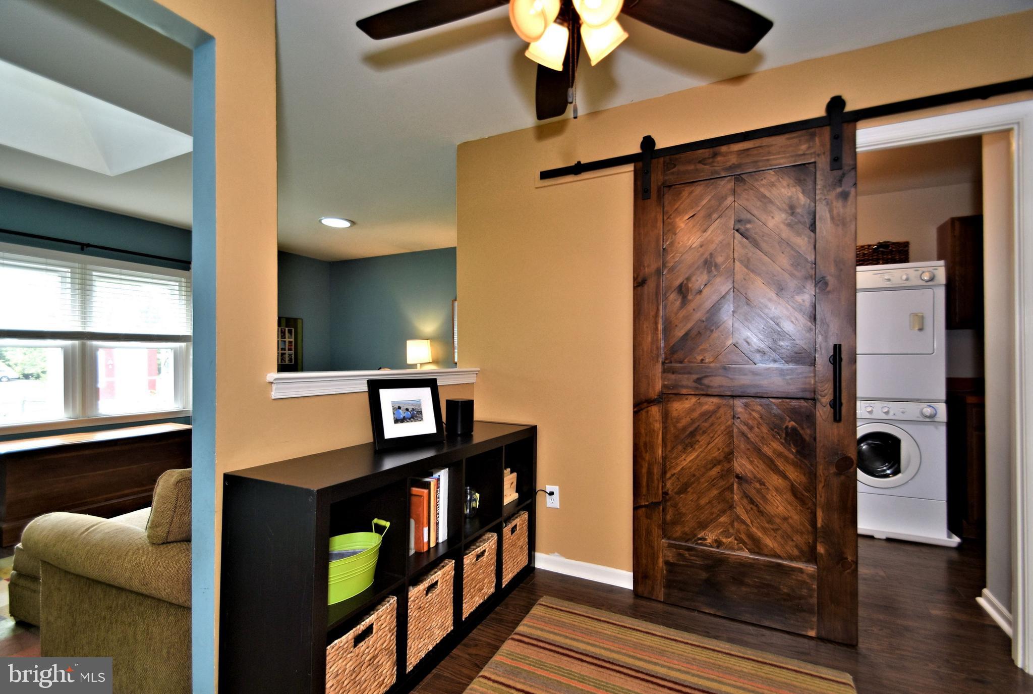 100 Olde Pilgrim Road Dublin, PA 18917 - Photo 15 of 41 Custom-built barn door separates the laundry room