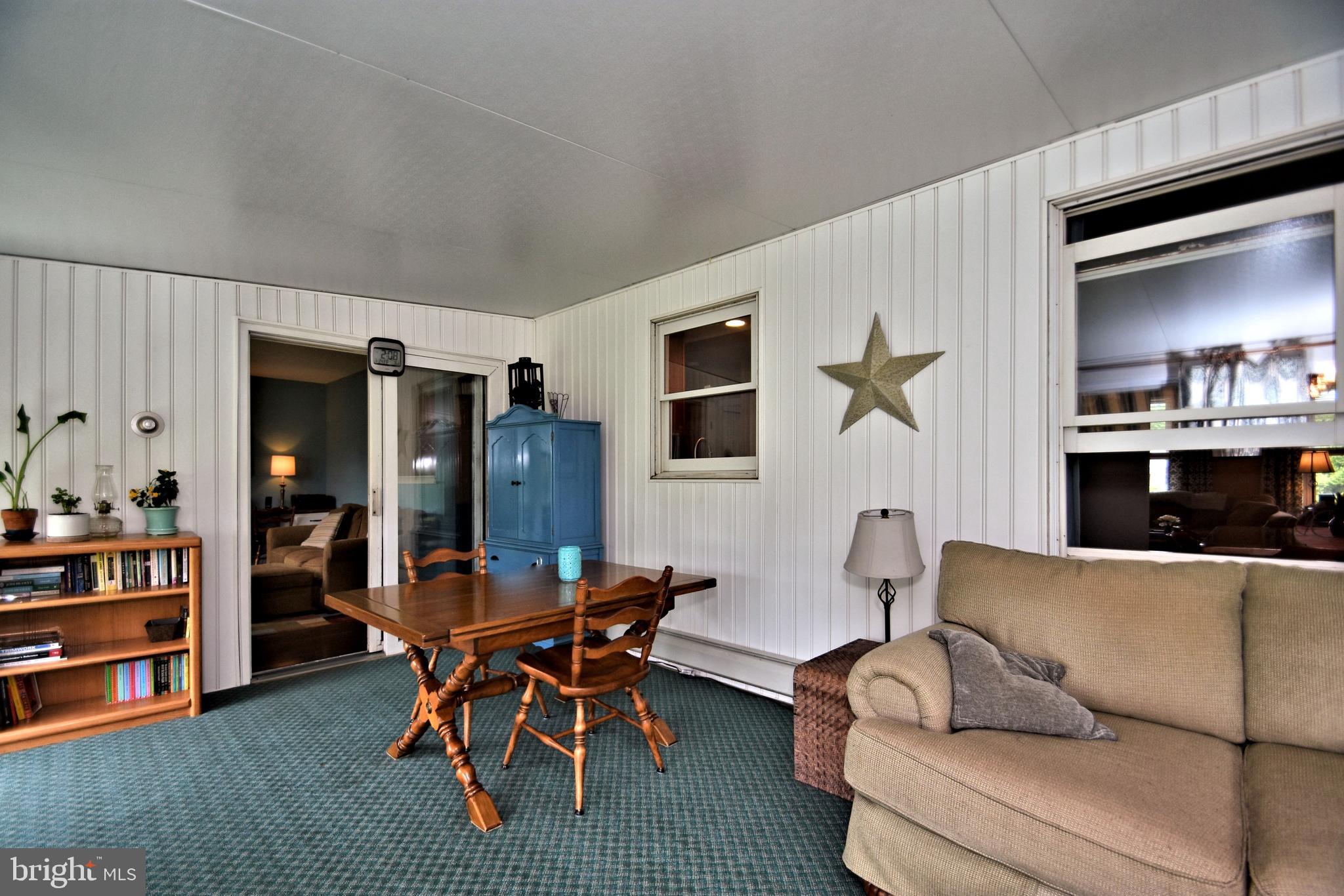 100 Olde Pilgrim Road Dublin, PA 18917 - Photo 22 of 41 Sliding glass doors between den & porch