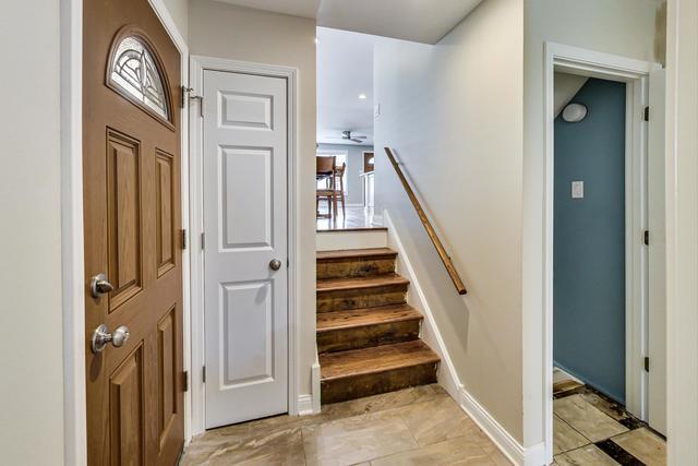 3702 South Normal Avenue Chicago, IL 60609 - Photo 21 of 36 a view of a hallway with entryway and stairs
