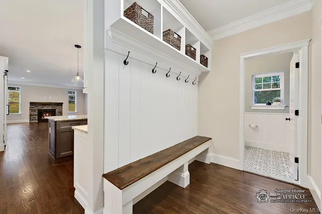a view of kitchen with furniture and wooden floor