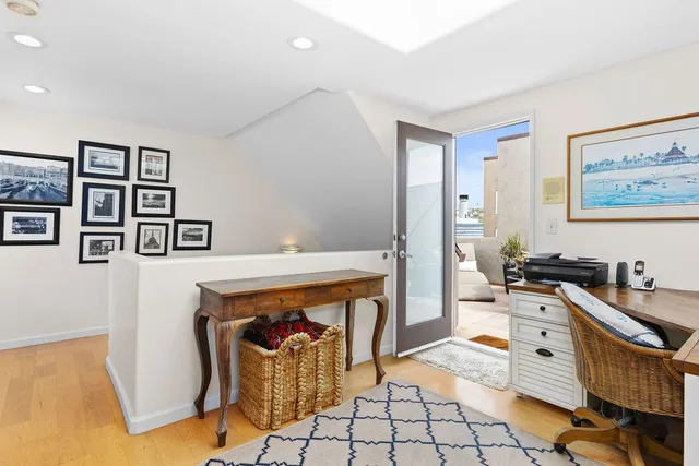 a kitchen with stainless steel appliances a stove a sink and a refrigerator