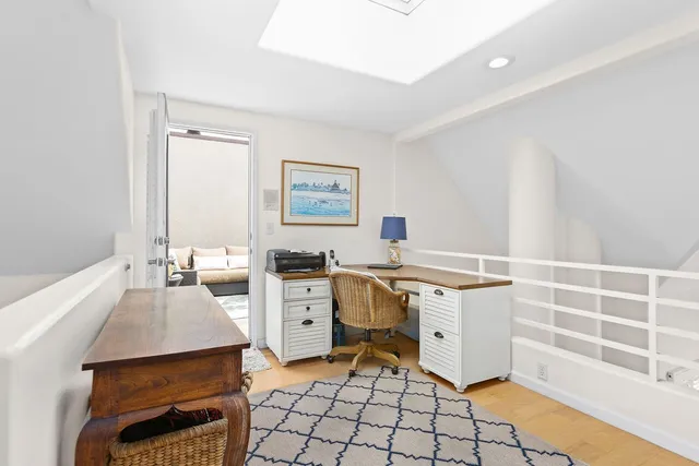 a kitchen with a stove a sink and a refrigerator