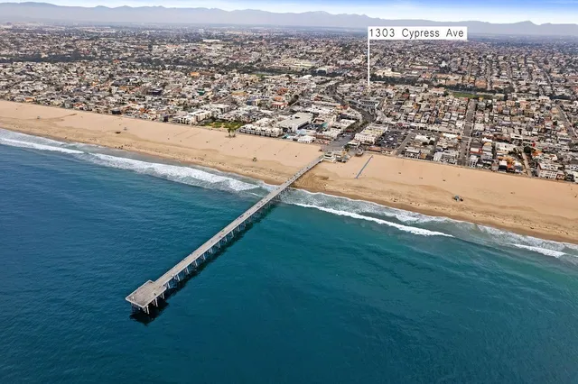 an aerial view of beach and ocean