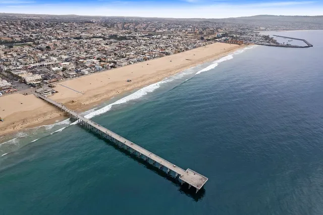 a view of a swimming pool with a lounge chairs