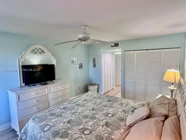 a bathroom with a shower and a bath tub