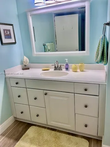 a view of a garden with a building in the background