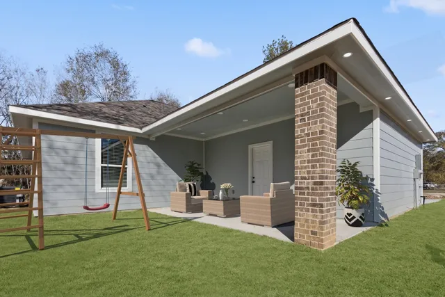 front view of a house with a yard