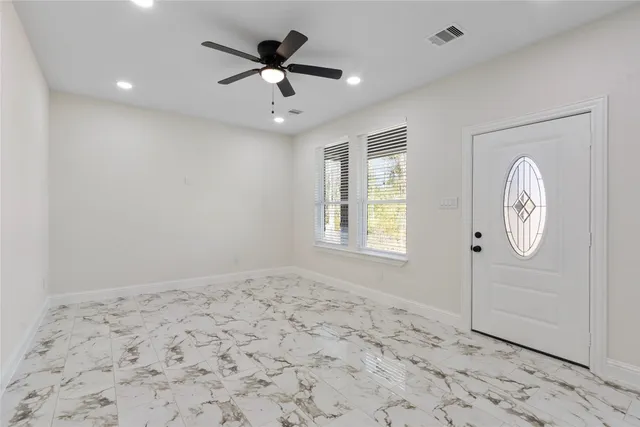 a view of a livingroom with a workspace