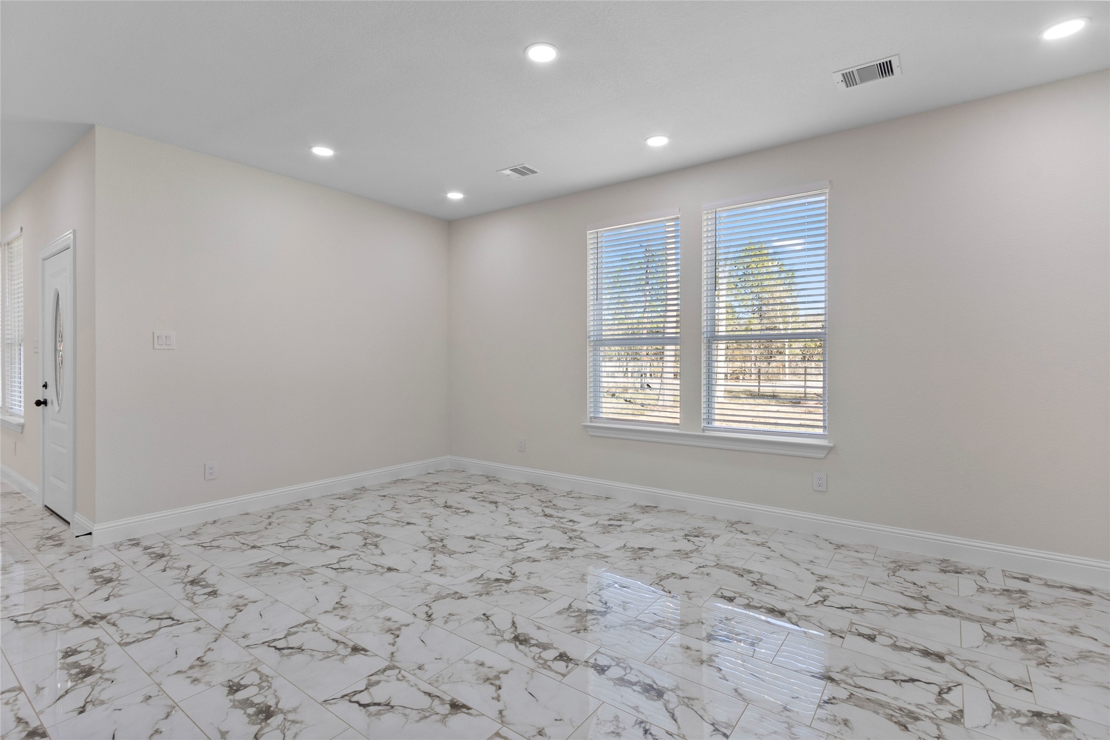 155 County Road 3372 Cleveland, TX 77327 - Photo 31 of 36 a view of a big room with wooden floor and bedroom