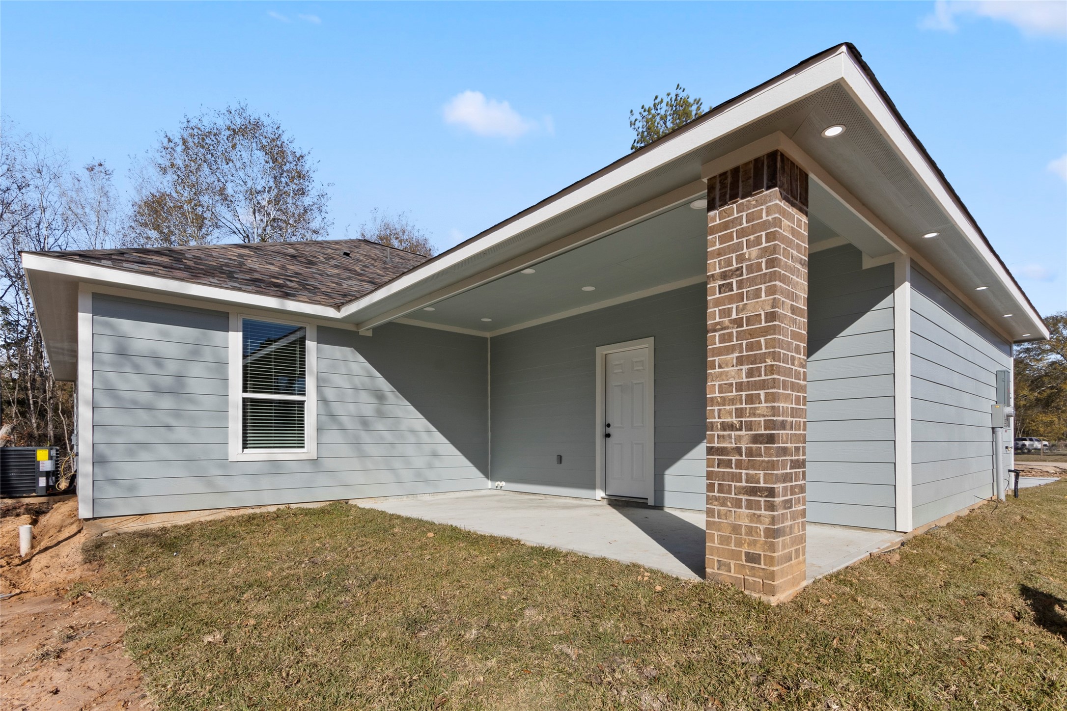 155 County Road 3372 Cleveland, TX 77327 - Photo 36 of 36 a view of a house with a staircase