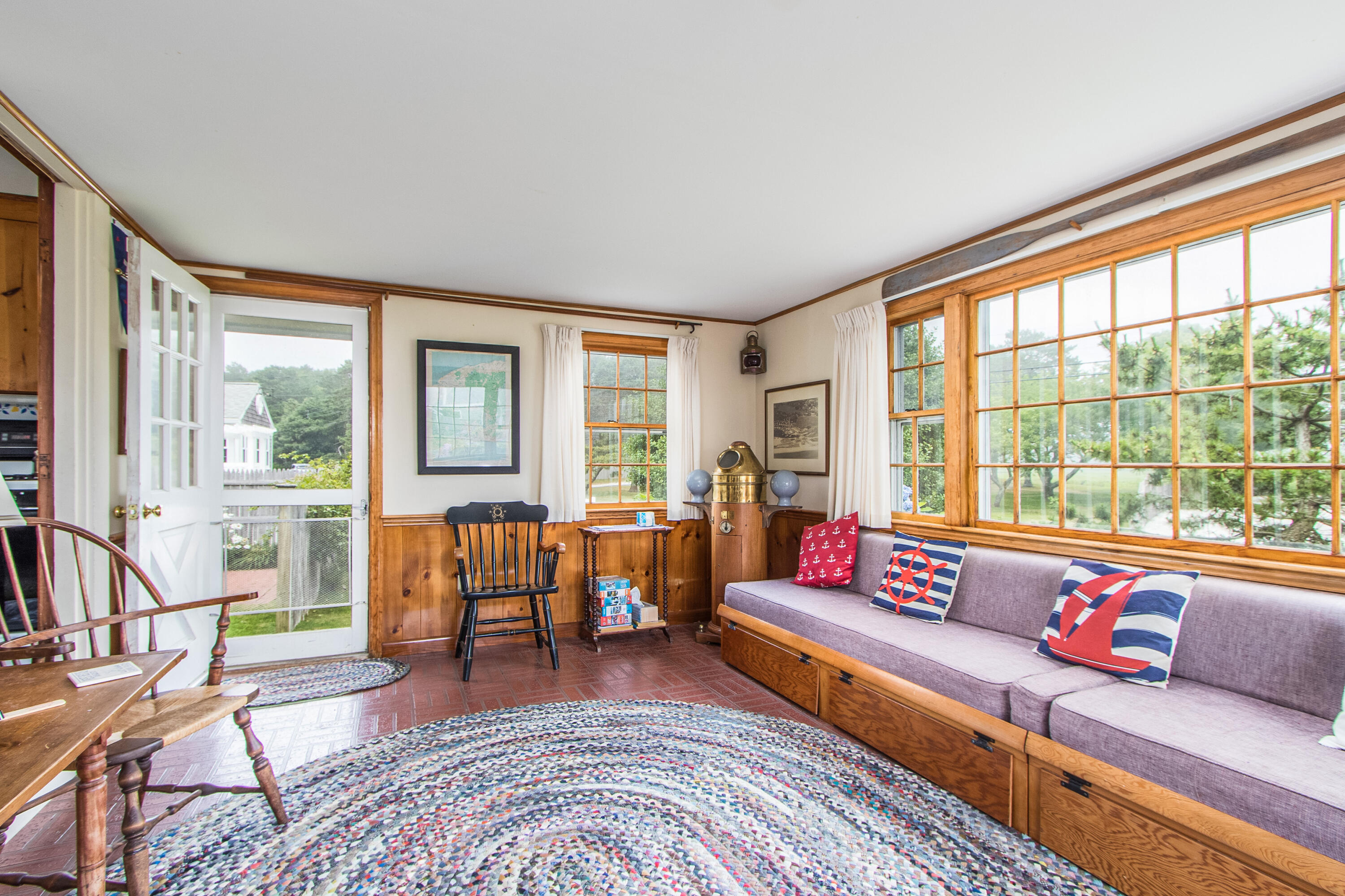 92 Surfside Road West Dennis, MA 02670 - Photo 13 of 38 a living room with furniture and a large window
