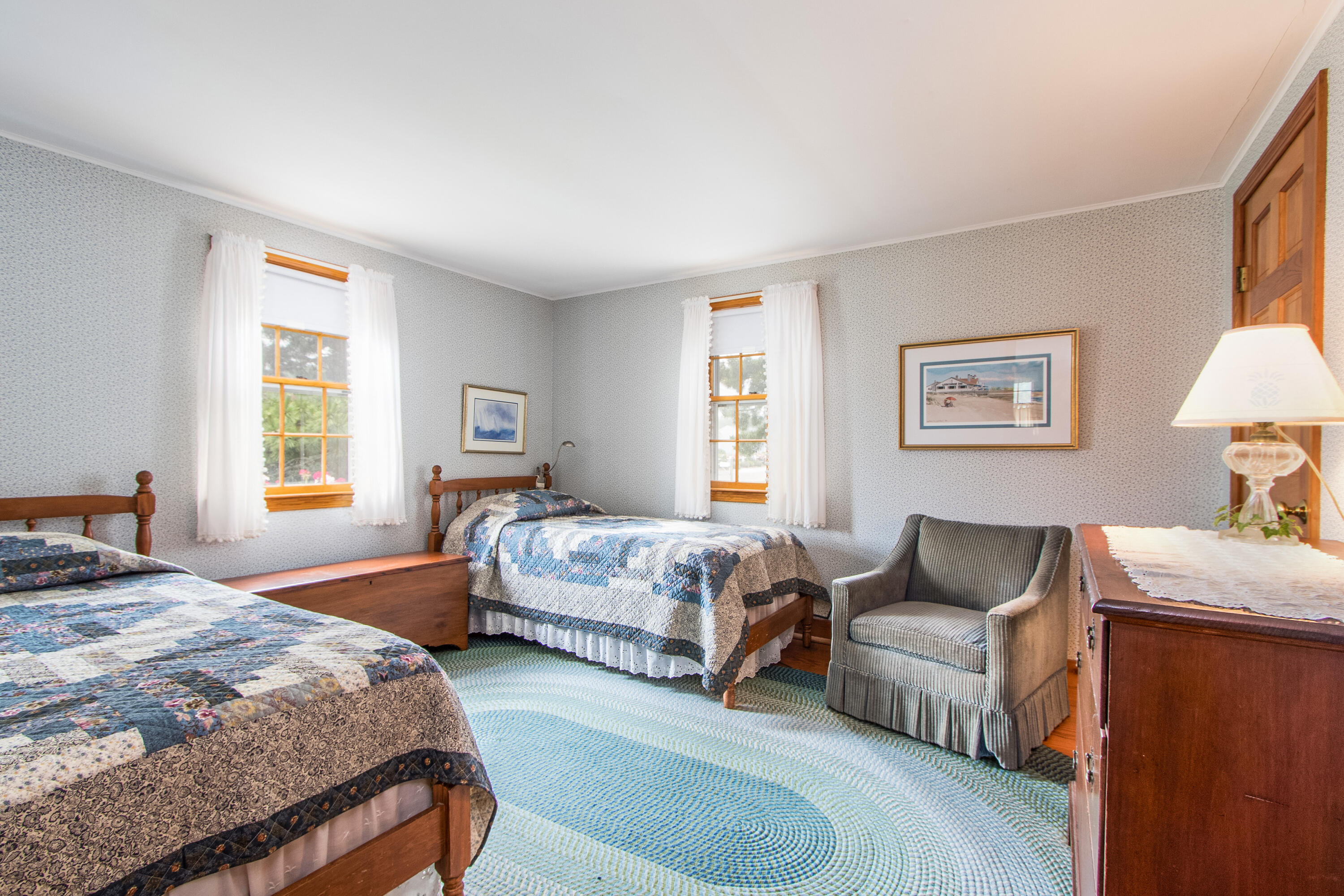 92 Surfside Road West Dennis, MA 02670 - Photo 19 of 38 a bedroom with a bed couch and window