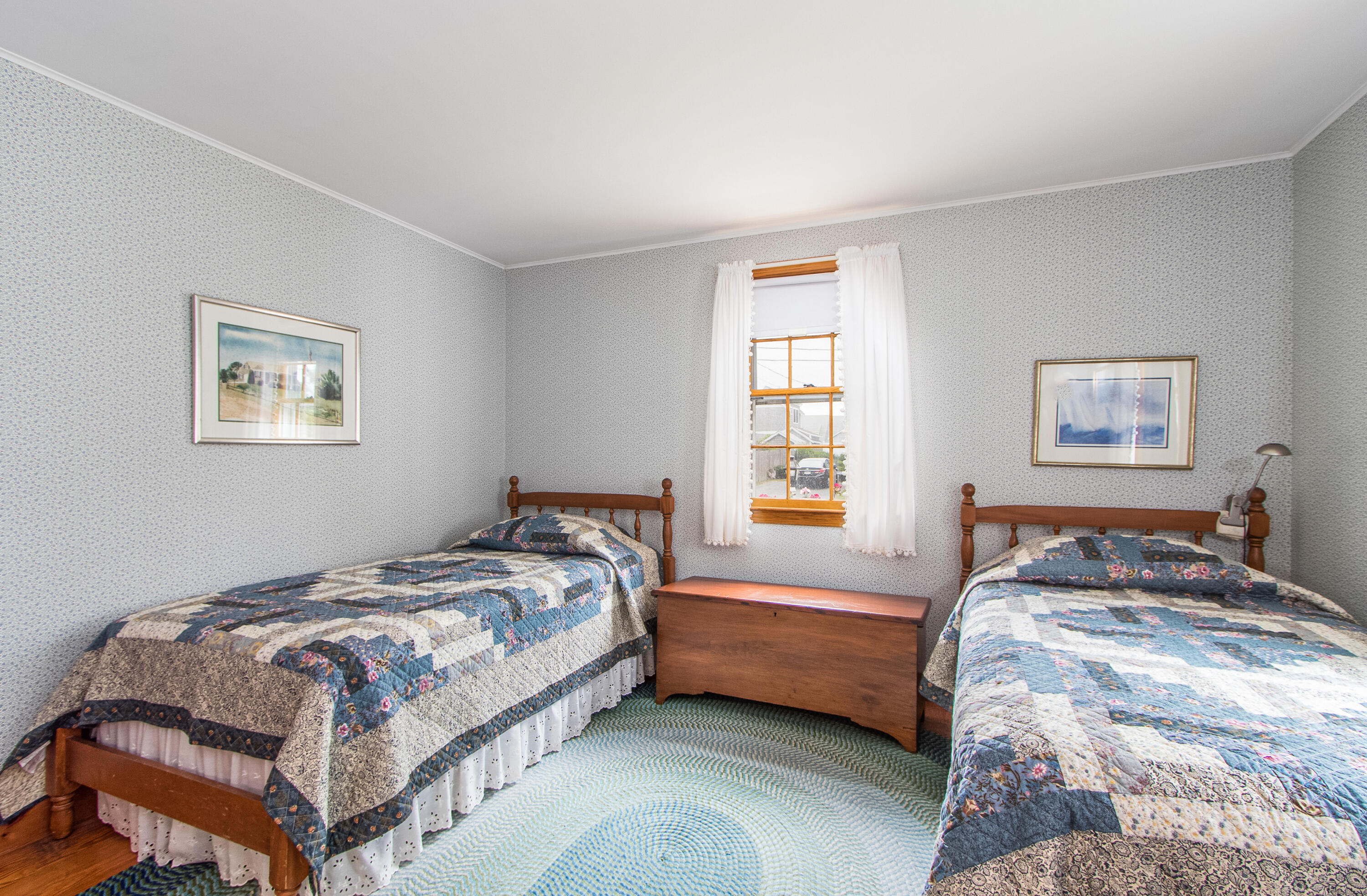 92 Surfside Road West Dennis, MA 02670 - Photo 20 of 38 a bedroom with a bed and a window