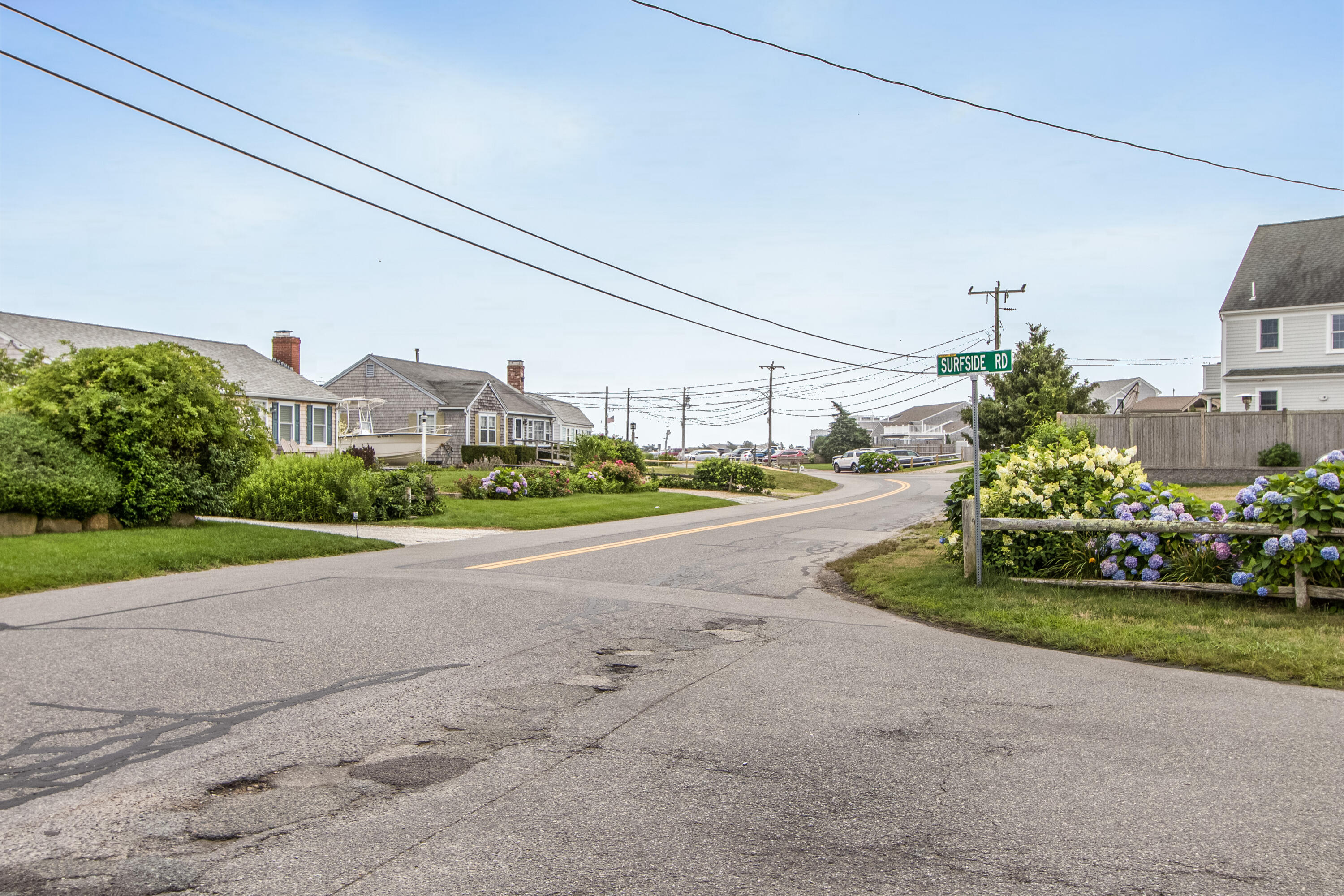 92 Surfside Road West Dennis, MA 02670 - Photo 36 of 38 a view of a street with a houses