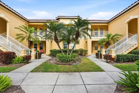 a view of a building with a garden
