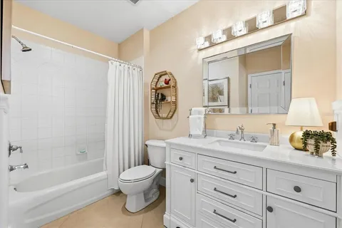 a view of a house with backyard porch and sitting area