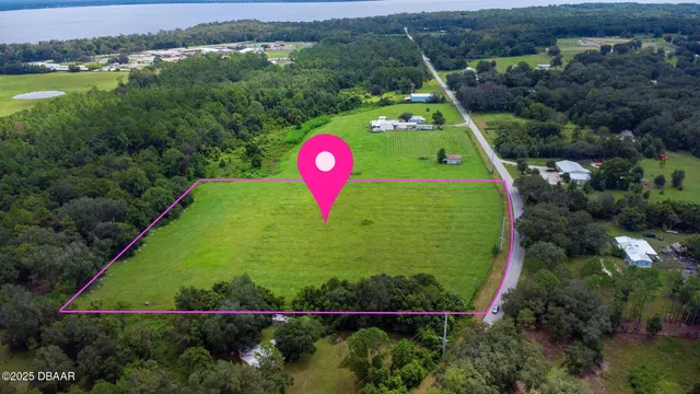 a view of a back yard with a garden