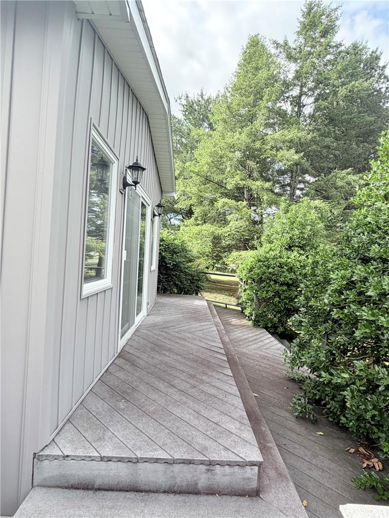 5963 Valley Road Slatington, PA 18080 - Photo 19 of 20 A private deck provides a tranquil outdoor retreat amidst lush surrounding greenery.