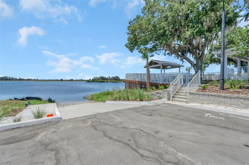 5768 Stephens Road St. Cloud, FL 34771 - Photo 50 of 50 a front view of a house with lake and trees