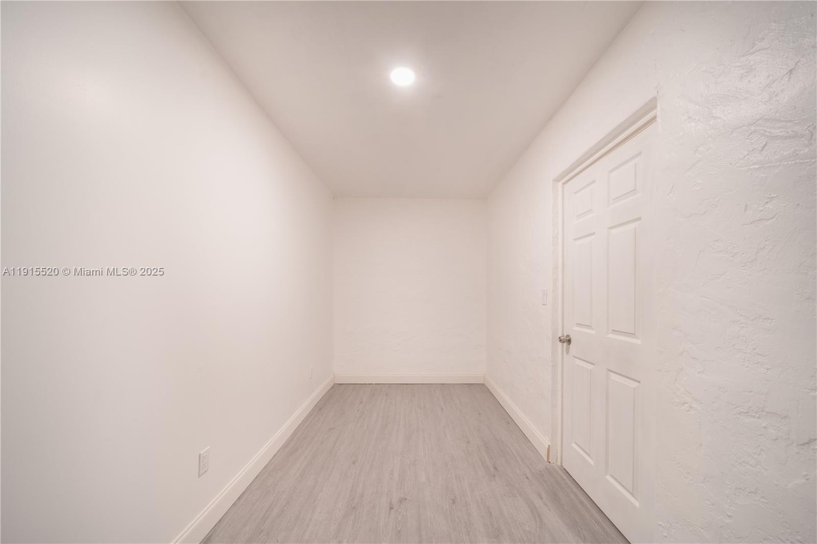 435 Southwest 33rd Avenue, Unit 4 Miami, FL 33135 - Photo 14 of 22 a view of a room with wooden floor