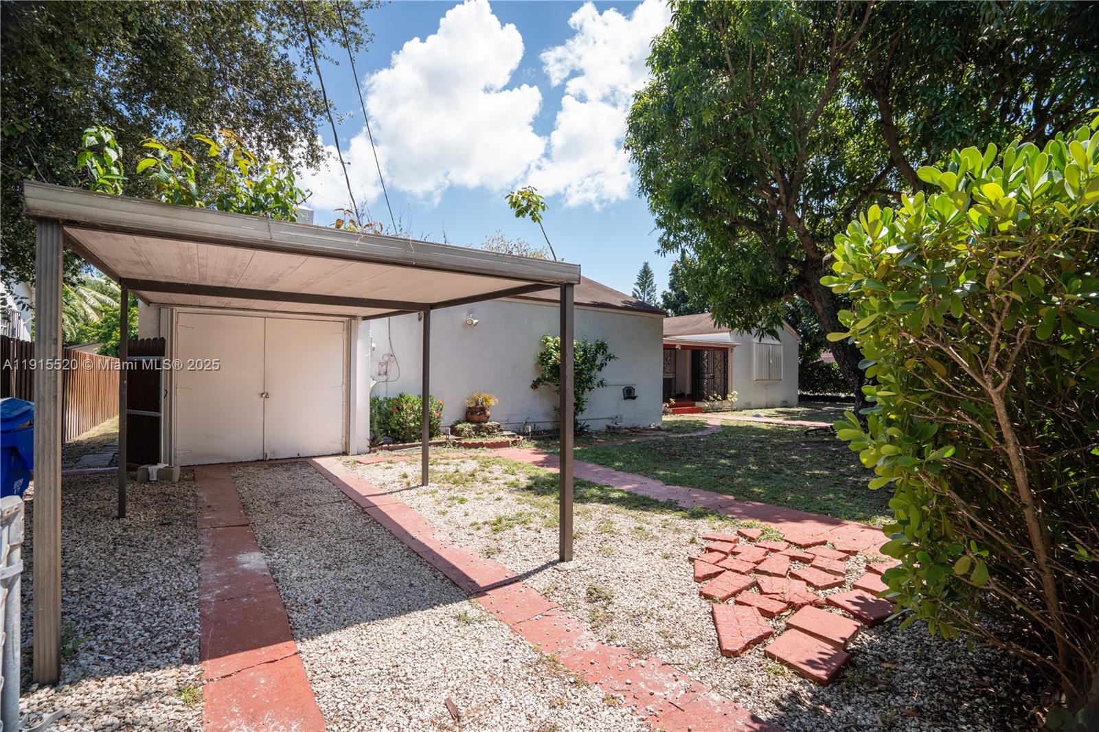 435 Southwest 33rd Avenue, Unit 4 Miami, FL 33135 - Photo 19 of 22 a view of a house with backyard