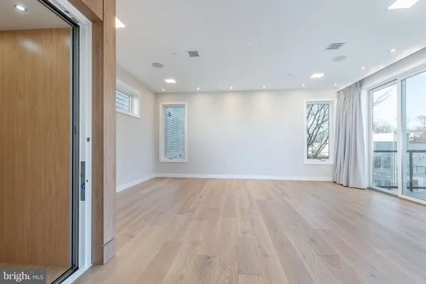 a bathroom with a shower and a mirror