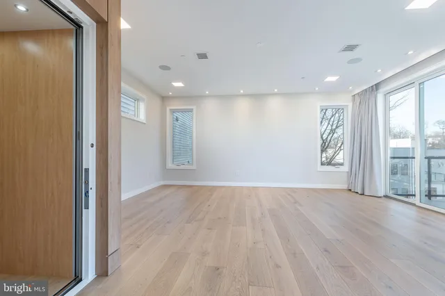 a bathroom with a shower and a mirror