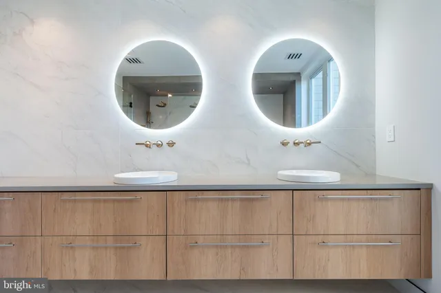 a bathroom with a toilet and a sink